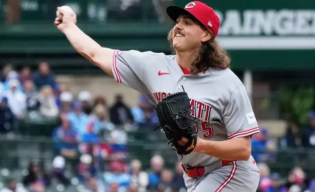 Cincinnati Reds starting pitcher Rhett Lowder throws during the first inning of a baseball game against the Chicago Cubs in Chicago, Thursday, May 7, 2026. (AP Photo/Nam Y. Huh)