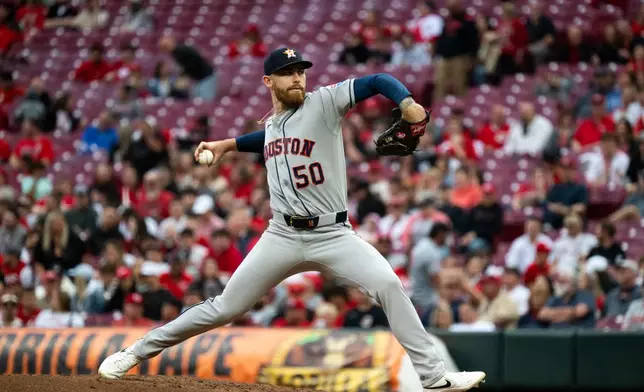 Houston Astros pitcher Mike Burrows delivers in the third inning of a baseball game against the Cincinnati Reds, Friday, May 8, 2026, in Cincinnati. (AP Photo/Michael Swensen)