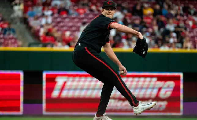 Cincinnati Reds pitcher Nick Lodolo delivers in the third inning of a baseball game against the Houston Astros, Friday, May 8, 2026, in Cincinnati. (AP Photo/Michael Swensen)