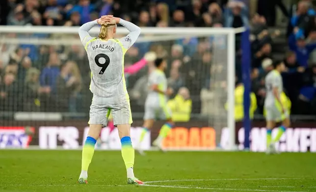 Manchester City's Erling Haaland reacts after Everton scored during the Premier League soccer match between Manchester City and Everton in Liverpool, England, Monday, May 4, 2026. (AP Photo/Dave Thompson)