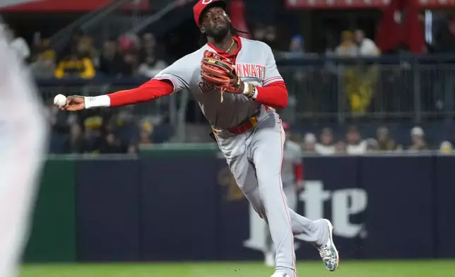 Cincinnati Reds shortstop Elly De La Cruz throws out Pittsburgh Pirates' Konnor Griffin at first base in the fourth inning of a baseball game in Pittsburgh, Friday, May 1, 2026. (AP Photo/Tom E. Puskar)