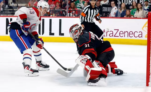 Montréal Canadiens' Ivan Demidov (93) shoots the puck past Carolina Hurricanes goaltender Frederik Andersen (31) for a goal during the first period in Game 1 of the Eastern Conference finals NHL hockey Stanley Cup playoffs series in Raleigh, N.C., Thursday, May 21, 2026. (AP Photo/Karl DeBlaker)