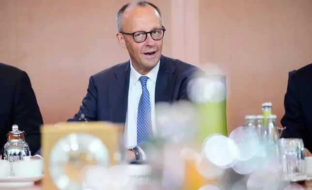 German Chancellor Friedrich Merz attends the cabinet meeting at the chancellery in Berlin, Germany, Wednesday, May 20, 2026. (AP Photo/Ebrahim Noroozi)