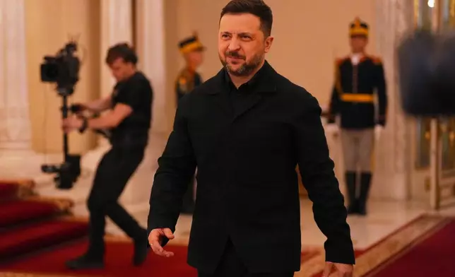 Ukraine's President Volodymyr Zelenskyy arrives at the Bucharest B9 summit held at the Cotroceni Presidential Palace in Bucharest, Romania, Wednesday, May 13, 2026. (AP Photo/Vadim Ghirda)