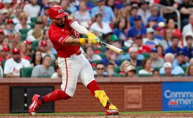 St. Louis Cardinals' Iván Herrera hits a solo home run during the fifth inning of a baseball game against the Chicago Cubs, Friday, May 29, 2026, in St. Louis. (AP Photo/Scott Kane)