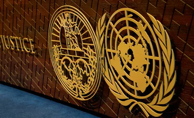 The logo of the International Court of Justice displayed on the judges' bench as the court opens a week of hearings in a border dispute dating back to the end of the 19th century between Guyana and Venezuela, in The Hague, Netherlands, Monday, May 4, 2026. (AP Photo/Peter Dejong)