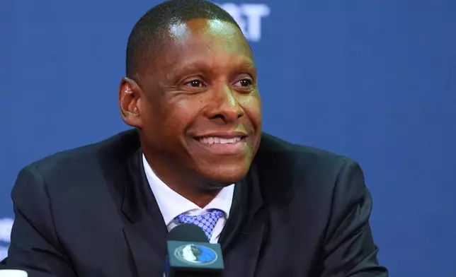 Dallas Mavericks' new team president Masai Ujiri smiles during an introductory NBA basketball news conference in Dallas, Tuesday, May 5, 2026. (AP Photo/LM Otero)