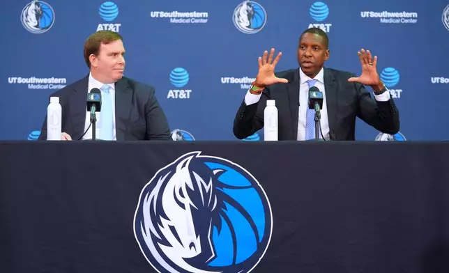 Dallas Mavericks's new team president Masai Ujiri, right, speaks as team governor Patrick Dumont looks on during an introductory NBA basketball news conference in Dallas, Tuesday, May 5, 2026. (AP Photo/LM Otero)