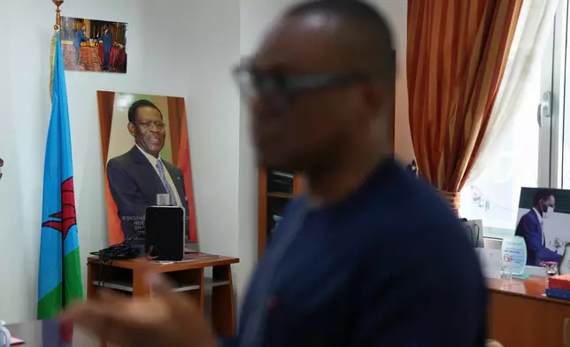 Framed portraits of Equatorial Guinea President, Teodoro Obiang Nguema Mbasogo, displayed in an office setting in Malabo, Equatorial Guinea, Friday, April 24, 2026. (AP Photo/Misper Apawu)