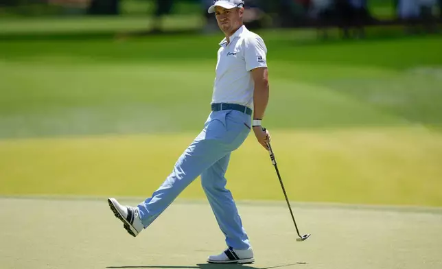 Justin Thomas reacts after missing a putt for birdie on the second hole during the final round of the Truist Championship golf tournament at the Quail Hollow Club, Sunday, May 10, 2026, in Charlotte, N.C. (AP Photo/Chris Carlson)