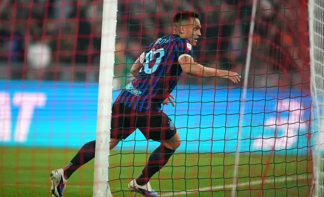Inter Milan's Lautaro Martinez celebrates after scoring his side's second goal during the Italian Cup soccer final between Lazio and Inter Milan, in Rome, Wednesday, May 13, 2026. (AP Photo/Andrew Medichini)