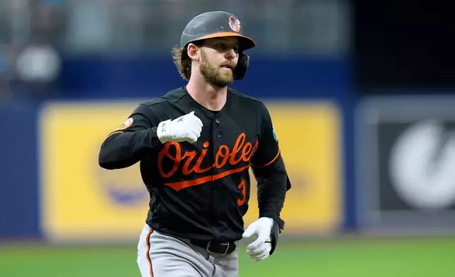 Baltimore Orioles' Taylor Ward celebrates his home run off Tampa Bay Rays pitcher Griffin Jax during the first inning of a baseball game Tuesday, May 19, 2026, in St. Petersburg, Fla. (AP Photo/Chris O'Meara)