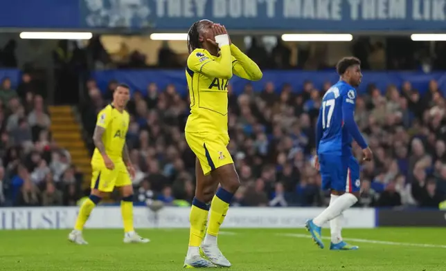 Tottenham's Destiny Udogie reacts during a Premier League soccer match between Chelsea and Tottenham in London, Tuesday, May 19, 2026. (AP Photo/Kirsty Wigglesworth)