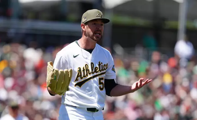 Athletics pitcher Jeffrey Springs reacts after a balk is called on him during the fourth inning of a baseball game against the San Francisco Giants Sunday, May 17, 2026, in West Sacramento, Calif. (AP Photo/Alan Greth)