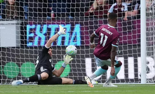 Burnley's Jaidon Anthony scores during the English Premier League soccer match between Burnley and Aston Villa in Burnley, England, Sunday May 10, 2026. (Martin Rickett/PA via AP)