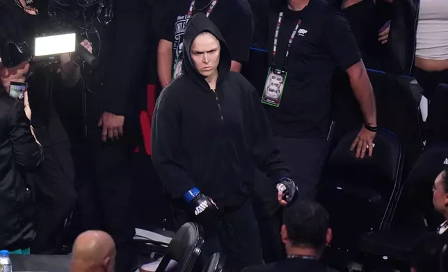Ronda Rousey, of the United States, is introduced before facing Gina Carano, of the United States, in a featherweight mixed martial arts fight Saturday, May 16, 2026, in Inglewood, Calif. (AP Photo/Jae C. Hong )