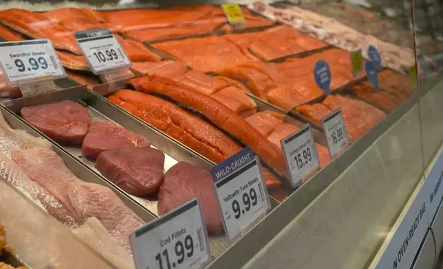 Fresh fish are seen at a grocery store Monday, May 11, 2026, in Nashville, Tenn. (AP Photo/George Walker IV)