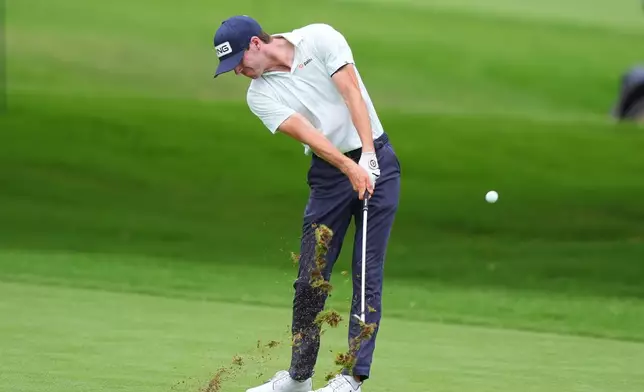 Alex Smalley hits from the ninth fairway during the first round of the Charles Schwab Challenge golf tournament at Colonial Country Club in Fort Worth, Texas, Thursday, May 28, 2026. (AP Photo/LM Otero)