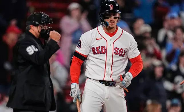 Boston Red Sox's Jarren Duran strikes out to end the baseball game against the Philadelphia Phillies, Thursday, May 14, 2026, in Boston. (AP Photo/Charles Krupa)