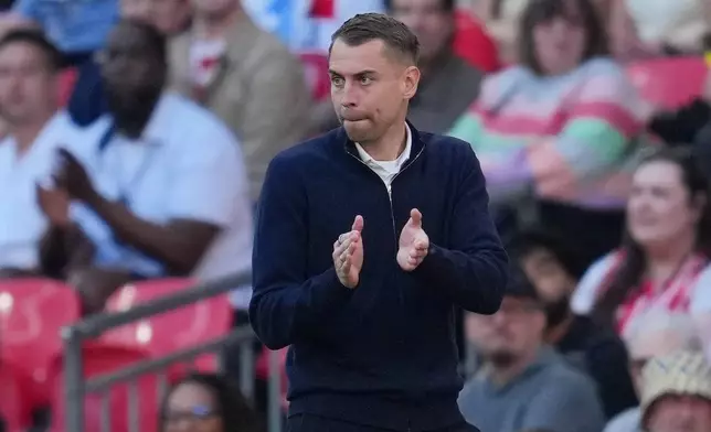 FILE - Southampton's coach Tonda Eckert reacts during the FA Cup semifinal soccer match between Manchester City and Southampton in Manchester, England, Saturday, April 25, 2026. (AP Photo/Kin Cheung, File(