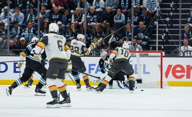 Vegas Golden Knights center Colton Sissons (10) scores the goal against Utah Mammoth goaltender Karel Vejmelka (70) during the third period of Game 6 in the first round of an NHL hockey Stanley Cup playoff series, Friday, May 1, 2026, in Salt Lake City. (AP Photo/Melissa Majchrzak)