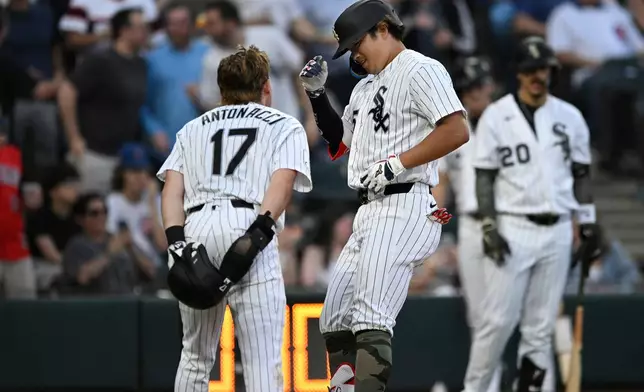 Chicago White Sox's Munetaka Murakami celebrates with teammate Sam Antonacci (17) at home plate after hitting a two-run home run during the fifth inning of a baseball game against the Chicago Cubs in Chicago, Saturday, May 16, 2026. (AP Photo/Paul Beaty)