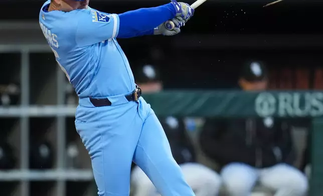 Kansas City Royals' Lane Thomas (15) breaks his bat on a swing during the third inning of a baseball game against the Chicago White Sox, Thursday, May 14, 2026, in Chicago. (AP Photo/Erin Hooley)