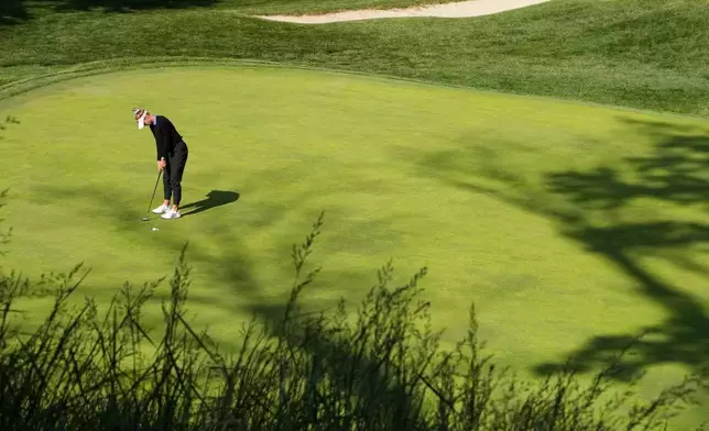 Nelly Korda putts on the 17th hole during the first round of the Queen City Championship LPGA golf tournament at Maketewah Country Club, Thursday, May 14, 2026, in Cincinnati. (AP Photo/Jeff Dean)