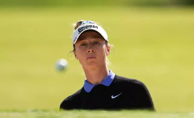 Nelly Korda plays a shot on the 16th hole during the first round of the Queen City Championship LPGA golf tournament at Maketewah Country Club, Thursday, May 14, 2026, in Cincinnati. (AP Photo/Jeff Dean)