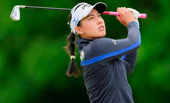 Jeeno Thitikul plays a shot from the fairway on the sixth hole during the first round of the Queen City Championship LPGA golf tournament at Maketewah Country Club, Thursday, May 14, 2026, in Cincinnati. (AP Photo/Jeff Dean)