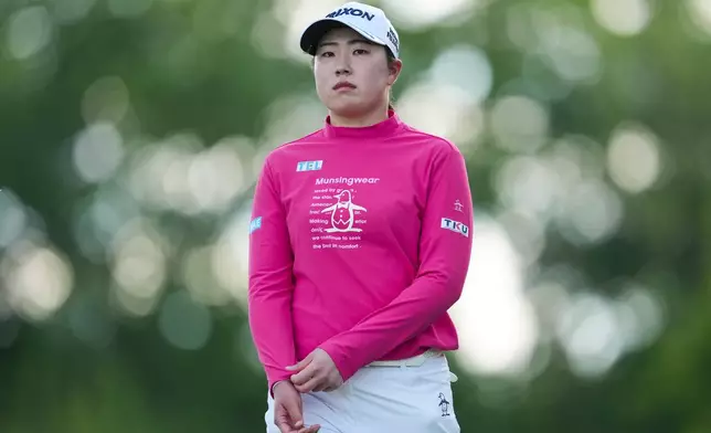 Rio Takeda looks on from the ninth hole during the first round of the Queen City Championship LPGA golf tournament at Maketewah Country Club, Thursday, May 14, 2026, in Cincinnati. (AP Photo/Jeff Dean)