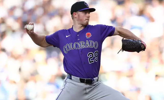 Colorado Rockies pitcher Tanner Gordon throws to a Los Angeles Dodgers batter during the first inning of a baseball game, Monday, May 25, 2026, in Los Angeles. (AP Photo/Jessie Alcheh)
