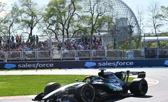 Mercedes driver George Russell of Britain drives during the qualifying session for the sprint race at the F1 Canadian Grand Prix auto race in Montreal, Friday, May 22, 2026. (Jacques Boissinot/The Canadian Press via AP)