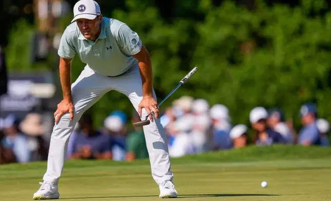 Jordan Spieth lines up his shot on the 11th green during the second round of the Cadillac Championship PGA golf tournament Friday, May 1, 2026, in Doral, Fla. (AP Photo/David J. Phillip)