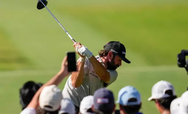 Cameron Young hits from the 12th tee during the second round of the Cadillac Championship PGA golf tournament Friday, May 1, 2026, in Doral, Fla. (AP Photo/David J. Phillip)