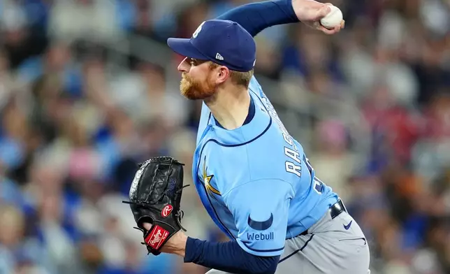 Tampa Bay Rays pitcher Drew Rasmussen works against the Toronto Blue Jays during first-inning baseball game action in Toronto, Monday, May 11, 2026. (Frank Gunn/The Canadian Press via AP)