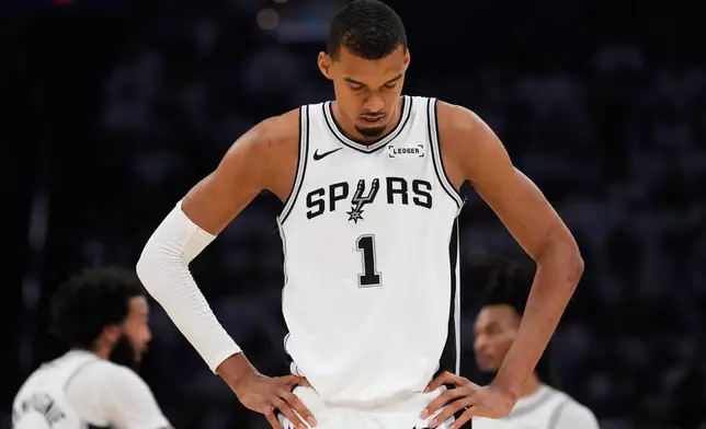 San Antonio Spurs forward Victor Wembanyama stands on the court during the second half of Game 2 in the Western Conference finals NBA basketball playoffs series against the Oklahoma City Thunder Wednesday, May 20, 2026, in Oklahoma City. (AP Photo/Tony Gutierrez)