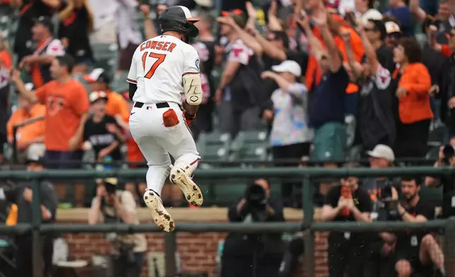 Baltimore Orioles' Colton Cowser celebrates after hitting a walkoff two-run home run during the 13th inning of a baseball game against the Tampa Bay Rays, Monday, May 25, 2026, in Baltimore. (AP Photo/Stephanie Scarbrough)