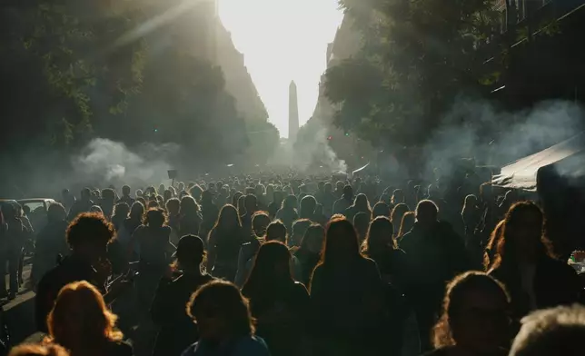 People protest to demand more funding for public universities in Buenos Aires, Argentina, Tuesday, May 12, 2026. (AP Photo/Rodrigo Abd)