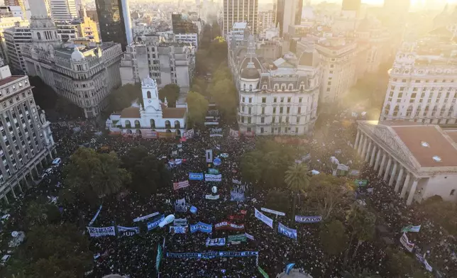 People protest to demand more fundings for public universities in Buenos Aires, Argentina, Tuesday, May 12, 2026. (AP Photo/Rodrigo Abd)