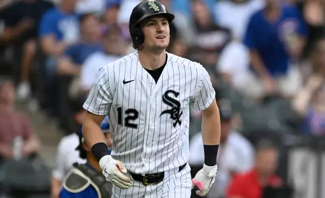 Chicago White Sox's Colson Montgomery watches his solo home run during the third inning of a baseball game against the Chicago Cubs in Chicago, Saturday, May 16, 2026. (AP Photo/Paul Beaty)