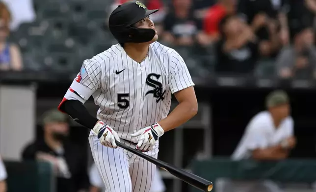 Chicago White Sox's Munetaka Murakami watches his solo home run during the third inning of a baseball game against the Chicago Cubs in Chicago, Saturday, May 16, 2026. (AP Photo/Paul Beaty)