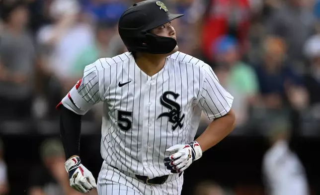 Chicago White Sox's Munetaka Murakami watches his solo home run during the third inning of a baseball game against the Chicago Cubs in Chicago, Saturday, May 16, 2026. (AP Photo/Paul Beaty)