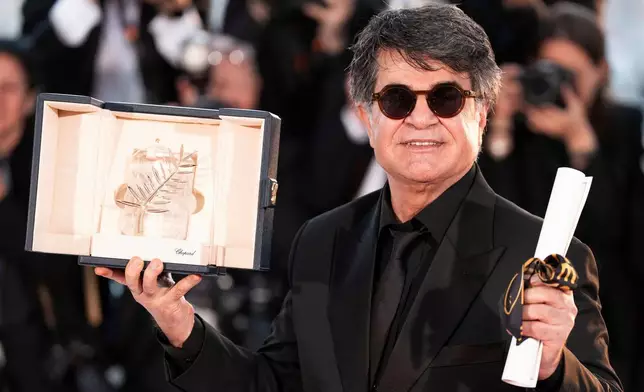 FILE - Director Jafar Panahi, winner of the Palme d'Or for the film "It Was Just an Accident," appears at the awards ceremony photo call at the 78th international film festival, Cannes, southern France, on May 24, 2025. (Photo by Scott A Garfitt/Invision/AP, File)