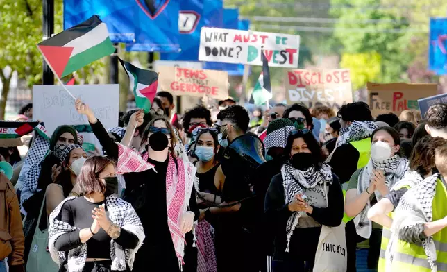 FILE- Pro-Palestinian protesters demonstrate on the campus of DePaul University, April 30, 2024, in Chicago. (AP Photo/Charles Rex Arbogast, file)