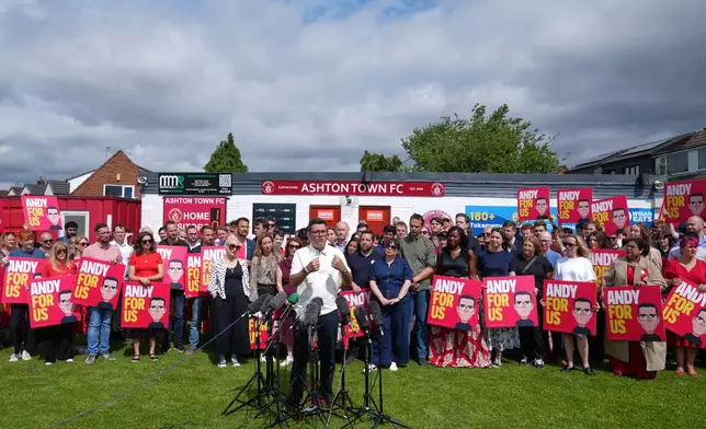 Britain's Labour party candidate Andy Burnham speaks to supporters after the Makerfield by-election in Ashton in Makerfield, England, Friday, June 19, 2026.(AP Photo/Jon Super)