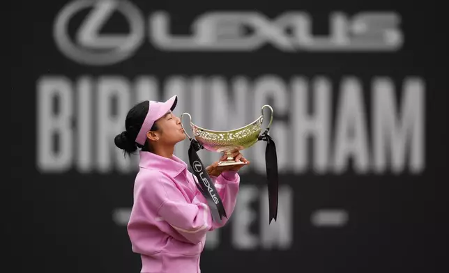 Philippines' Alexandra Eala celebrates winning her women's singles final match against Nikola Bartunkova on day nine of the Lexus Birmingham Open Championships at Edgbaston Priory Club, Birmingham, England, Sunday June 7, 2026. (Mike Egerton/PA via AP)