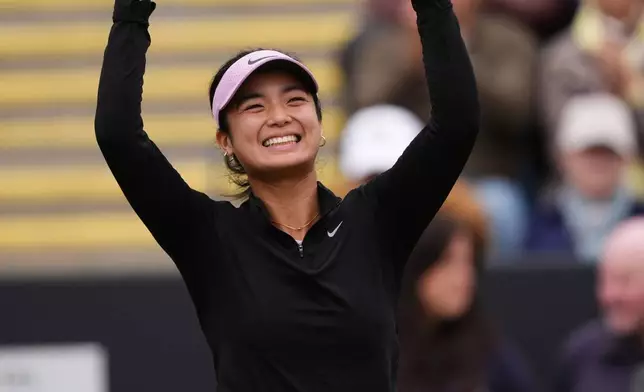 Philippines' Alexandra Eala celebrates winning her women's singles final match against Nikola Bartunkova on day nine of the Lexus Birmingham Open Championships at Edgbaston Priory Club, Birmingham, England, Sunday June 7, 2026. (Mike Egerton/PA via AP)