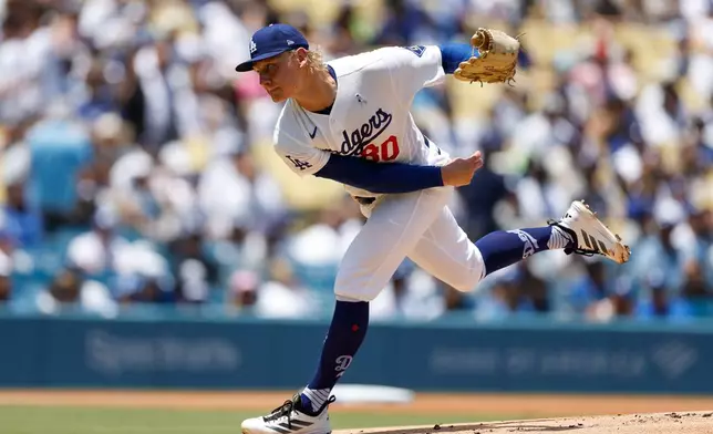 Los Angeles Dodgers starting pitcher Emmet Sheehan throws during the first inning of a baseball game against the Baltimore Orioles, Sunday, June 21, 2026, in Los Angeles. (AP Photo/Caroline Brehman)