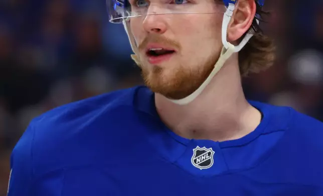 FILE - Buffalo Sabres defenseman Bowen Byram (4) looks on during the second period in Game 5 of a second-round NHL hockey Stanley Cup playoff series against the Montreal Canadiens Thursday, May 14, 2026, in Buffalo, N.Y. (AP Photo/Jeffrey T. Barnes,File)